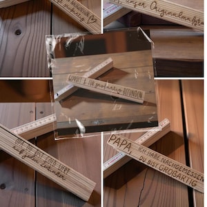 May include: Wooden folding rulers with engraved text. One ruler says "PAPA, I HAVE MEASURED YOU ARE GREAT". Another says "OPA, you are our original measure". Other rulers have similar messages.