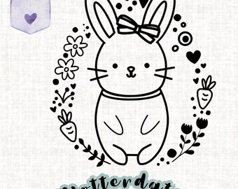 Puede incluir: Ilustración en blanco y negro de un conejo con un lazo en la cabeza. El conejo está rodeado de una corona de flores, corazones y zanahorias. El texto "Plotterdatei SVG.PNG.PDF" está en la parte inferior de la imagen.