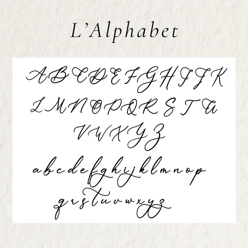 May include: A white background displays the uppercase and lowercase letters of the alphabet in a cursive font. The title "L'Alphabet" is written above the letters in a similar style.
