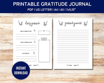 May include: Printable gratitude journal with two pages. The left page has a section for listing three things you are grateful for, three people you are grateful for, and a daily reflection. The right page has a lined section for writing down your thoughts. Both pages have a floral design at the top.