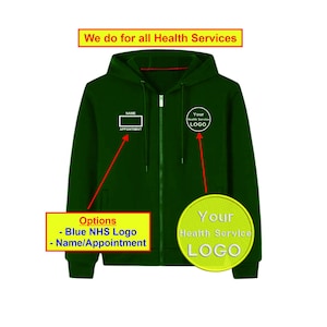May include: A dark green hooded sweatshirt with a zip fastening. The sweatshirt has a white embroidered name and appointment section on the left chest and a white embroidered logo on the right chest. The text "Your Health Service LOGO" is embroidered on the right sleeve. The text "We do for all Health Services" is printed in red at the top of the image. The text "Options - Blue NHS Logo - Name/Appointment" is printed in red on the left sleeve.