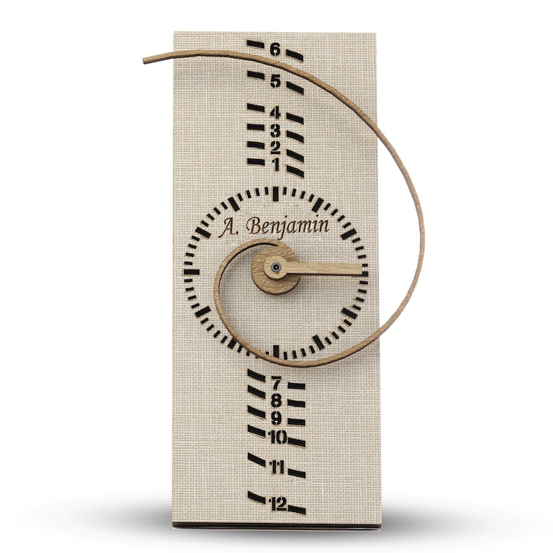 May include: A wooden clock with a spiral design and a wooden hand. The clock face has the text "A. Benjamin" and numbers 1 through 12. The clock is on a beige background.
