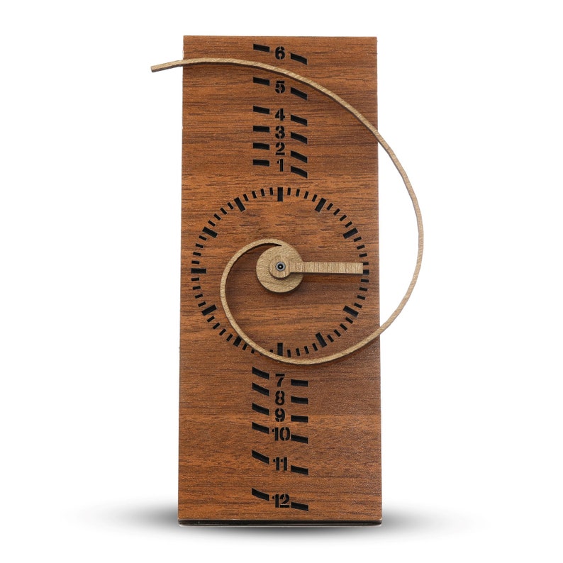 May include: A wooden clock with a spiral design and a circular face. The clock has numbers 1 through 12 around the face and a small hand that points to the time. The clock is mounted on a wooden base.