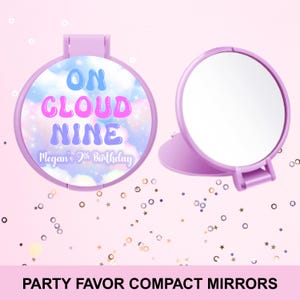 May include: Two lavender compact mirrors. One mirror is open, revealing a reflective surface. The other mirror has a design that reads "ON CLOUD NINE" in blue, pink, and purple, with "Megan's 9th Birthday" below. The background is a pastel sky.