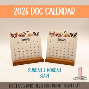 Pode incluir: Dois calendários de cães de 2026 com datas de janeiro. Cada calendário apresenta uma base de madeira e uma fila superior de ilustrações de rostos de cães. O texto "2026 DOG CALENDAR" está no topo. A frase "SUNDAY & MONDAY START" está na parte inferior.
