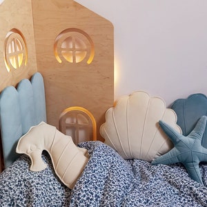 marine cushions set on bed in the bedroom, nautical home decor, soft and cozy decorations, for cosy kids corner, for snuggle baby nook, pillows in the shape of shell, starfish, seahorse, perfect gift idea for kids, for girl, for women, for her, mum
