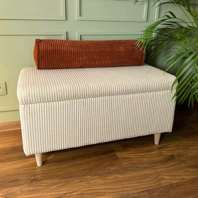 corduroy bench with a storage chest box in ecru with a corduroy bolster pillow on top