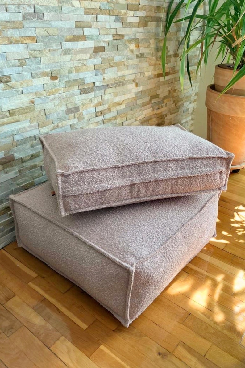 square pillow in boucle fabric for sitting on the floor for family house