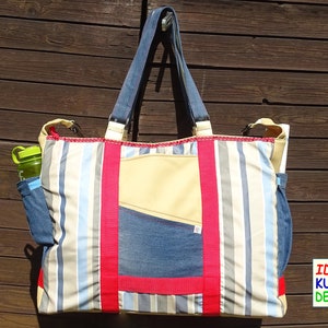 Grand sac bandoulière aux couleurs vives avec poche latérale, nombreuses poches extérieures et intérieures, bandoulière amovible, pièce unique cousue main
