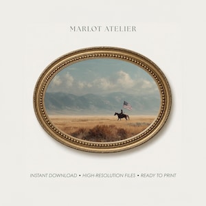 May include: An oval gold-toned frame containing a landscape painting of a rider on horseback carrying an American flag across a vast, dry prairie with distant mountains under a cloudy sky. The text MARLOT ATELIER appears above the frame.