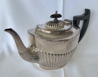 Silver plated teapot with gadroon decoration and timber handle and top of lid – early 20th century