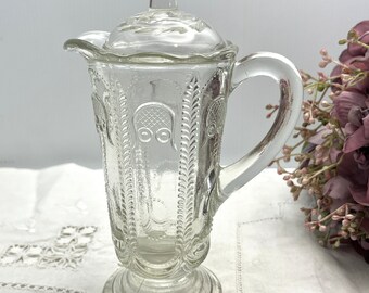 Crown Crystal Owl and Feather pattern small depression pressed glass lidded jug