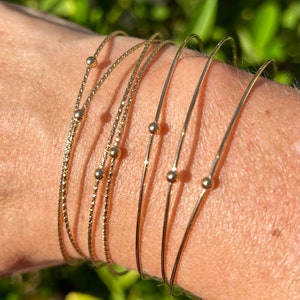 Bracelets joncs semainier dorés lot de 7, belle qualité, bracelets fins, bracelet femme cadeau, envoi rapide image 4