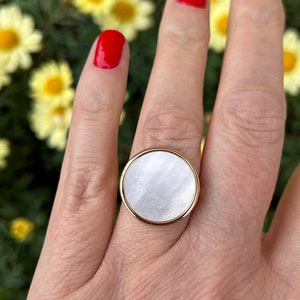 Bague ronde imitation ginette sale