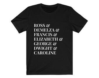 May include: Black t-shirt with white text that reads "ROSS & DEMELZA & FRANCIS & ELIZABETH & GEORGE & DWIGHT & CAROLINE"