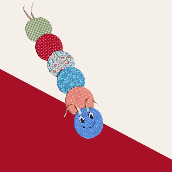 Soft colorful caterpillar to promote fine motor skills with Velcro