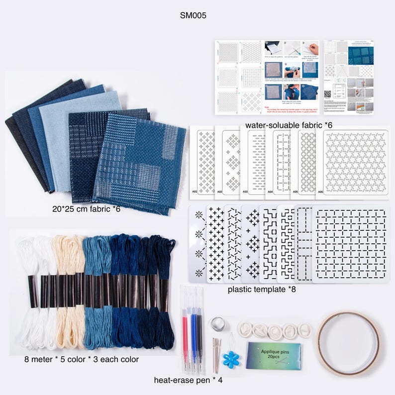 May include: A sashiko embroidery kit labeled SM005 containing six 20x25 cm fabric pieces in blue shades, six water-soluble fabric sheets, eight plastic templates, fifteen 8-meter embroidery threads, four heat-erase pens, needles, thimbles, and pins.