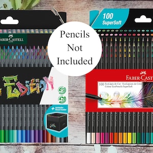May include: Two sets of 100 colored pencils in black packaging. The set on the left is labeled "Black Edition" and the set on the right is labeled "SuperSoft". The pencils are not included.