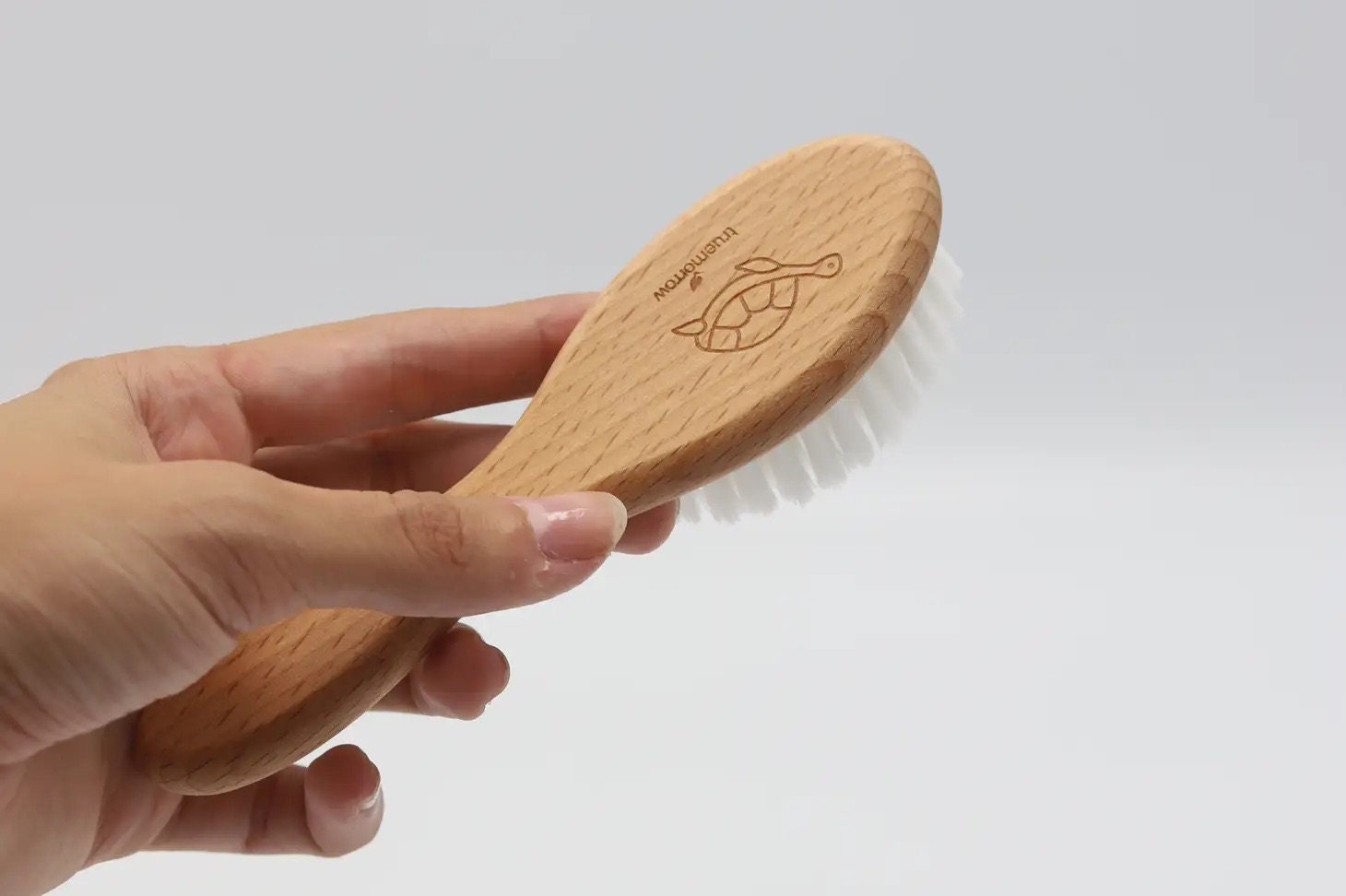 Vegan store baby brush