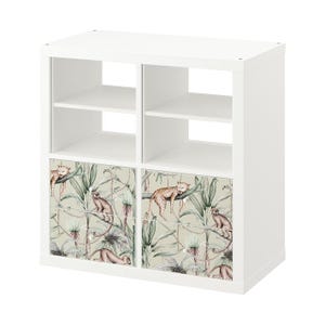 May include: White cube shelf unit with four compartments. The bottom two compartments have removable fronts with a jungle-themed print featuring leopards and monkeys.