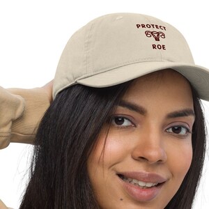 Protect Roe Baseball Hat. My body my choice. My body my choice apparel and accessories. Pro Choice hat. Abortion Rights. Roe v. Wade Hat. Feminist Hat. Womens Rights Hat. Pro Roe uterus hat. Feminist embroidered hat. Protect Roe uterus apparel.