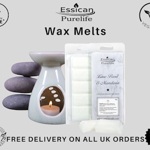 May include: A white ceramic wax warmer with a teal glaze and a teal candle inside. The warmer is surrounded by grey stones. A pack of white wax melts is shown with the text "Lime Basil & Mandarin" and "Essican Purelife" on the front. The pack is labelled "Luxury Handmade Wax Melts".