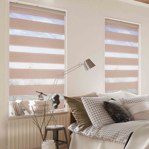 Twin Wide for Window Coveringuses a 3.75 inch tall type sheer and a 5.5 inch tall horizontal pleated semi-opaque fabric in a wide range of colour choices.. Provide view-through and visual privacy. Shades block up to 99% of UV rays when closed.