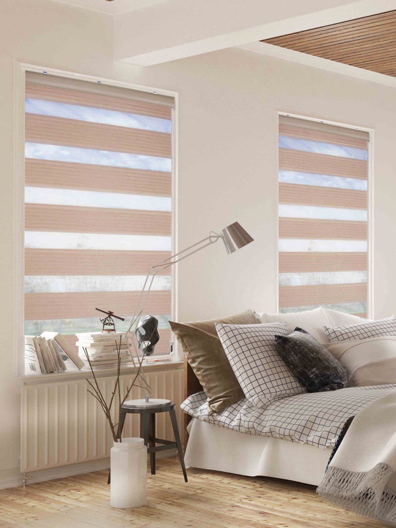 Twin Wide for Window Coveringuses a 3.75 inch tall type sheer and a 5.5 inch tall horizontal pleated semi-opaque fabric in a wide range of colour choices.. Provide view-through and visual privacy. Shades block up to 99% of UV rays when closed.