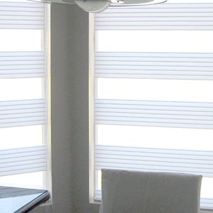Combi Shades, Twin Wide uses a 3.75 inch tall “mesh” type sheer and a 5.5 inch tall horizontal pleated semi-opaque fabric in a wide range of colour choices.. Provide view-through and visual privacy. Shades block up to 99% of UV rays when closed.