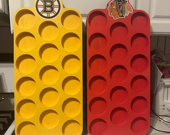 Présentoir pour rondelles de hockey : fixation murale, peut contenir 17 ou 18 rondelles