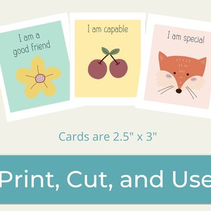 May include: Three rectangular cards measuring 2.5 inches by 3 inches. The first card is light blue with a yellow flower and the text I am a good friend. The second is yellow with two cherries and the text I am capable. The third is pink with a fox and the text I am special.
