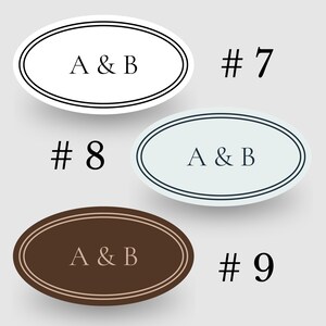 以下が含まれることがあります： 「A & B」の文字が印刷された3つの楕円形のステッカー。1つは黒い縁取りの白、もう1つは濃い青色の縁取りの薄い青色、3つ目は明るい茶色の縁取りの茶色です。数字の7、8、9も表示されています。