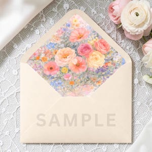 May include: A cream-coloured envelope with a floral interior design. The interior features a watercolour painting of pink, peach, yellow, and blue flowers. The word "SAMPLE" is printed on the front of the envelope.