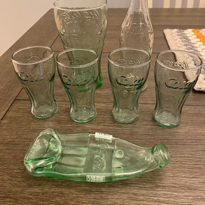 Vintage Coca-Cola Collectible Set: Green Juice Glasses & Melted Bottle Spoon Rest