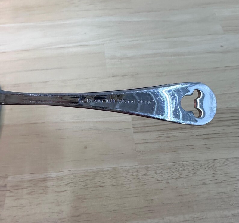 May include: A handmade wooden sign with the text "Welcome" in a playful font. The sign features a distressed white background and a dark brown frame, perfect for a front door or entryway. The sign measures approximately 12 inches wide and 6 inches tall.