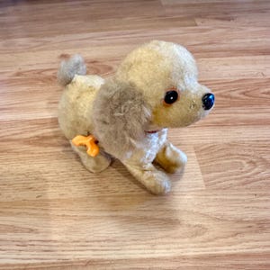 Vintage Jumping Wind-Up Dog Toy: Mechanical Puppy