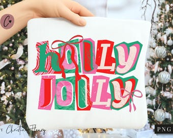 May include: A white tote bag with the words "HOLLY JOLLY" in a colorful, distressed font. The letters are red, green, and pink, with red ribbon accents. The bag is held by a person, with a Christmas tree in the background.