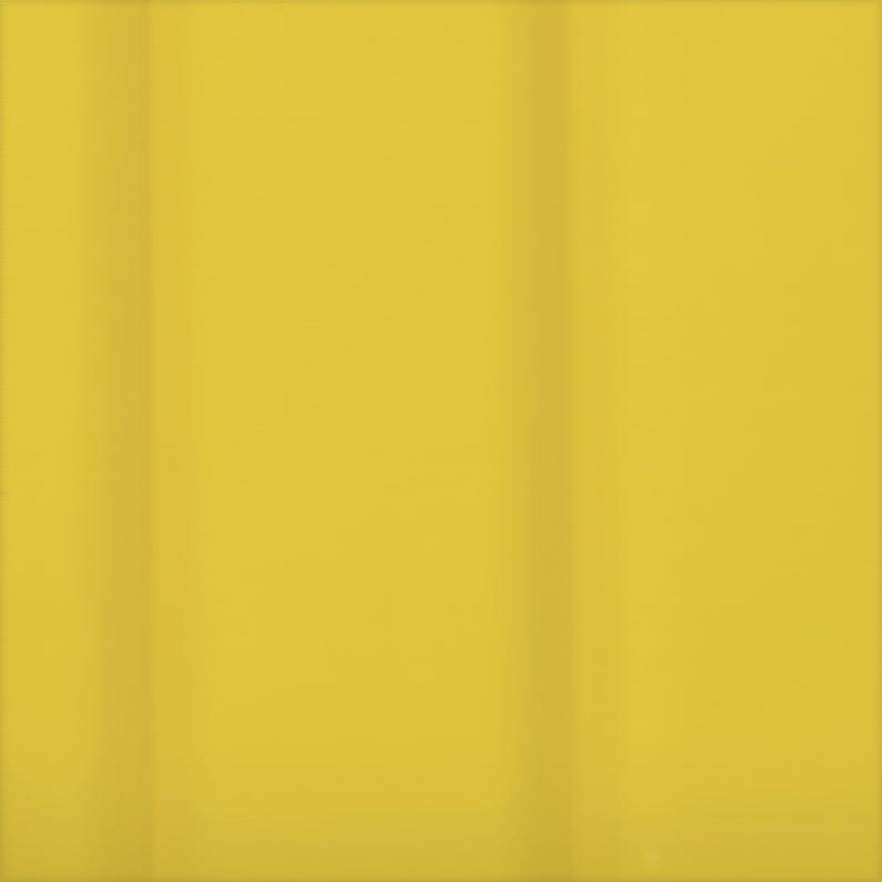 May include: A plain yellow background with vertical gradients of light and shadow. The image shows a close-up of a smooth, matte surface, with subtle tonal variations creating depth and texture. The colour is a warm, sunny yellow.