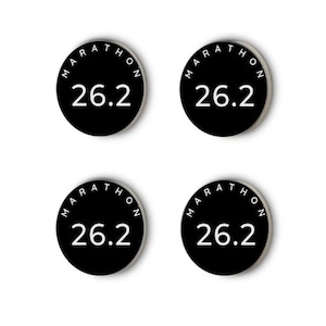 May include: Four black round buttons with white text. Each button says "Marathon 26.2"