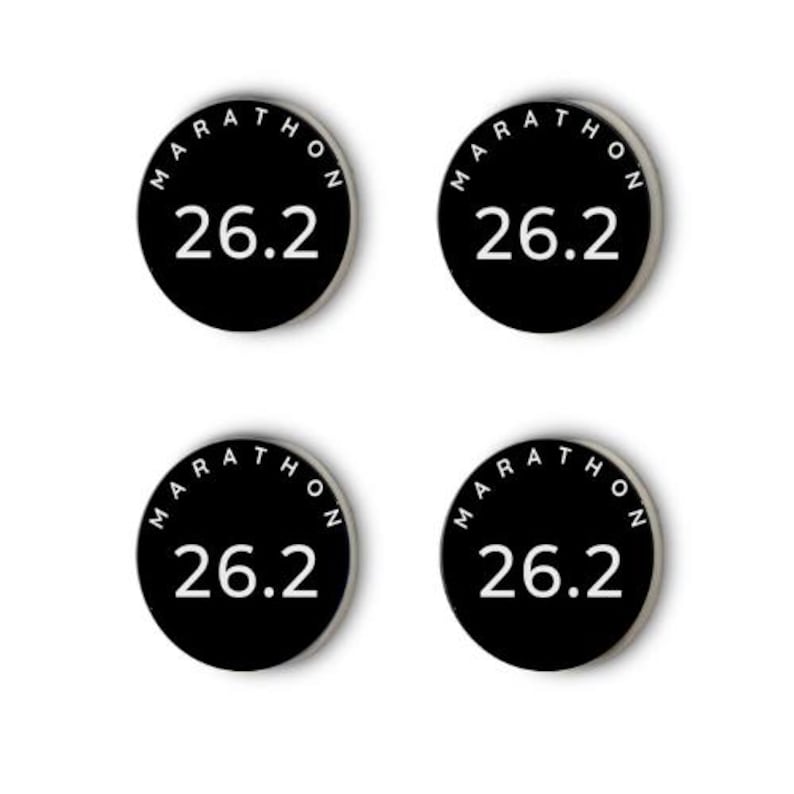 May include: Four black round buttons with white text. Each button says "Marathon 26.2"