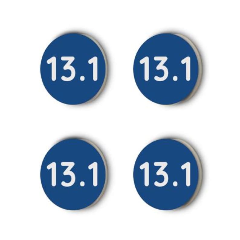 May include: Four blue round stickers with white text that reads "13.1" on each sticker.