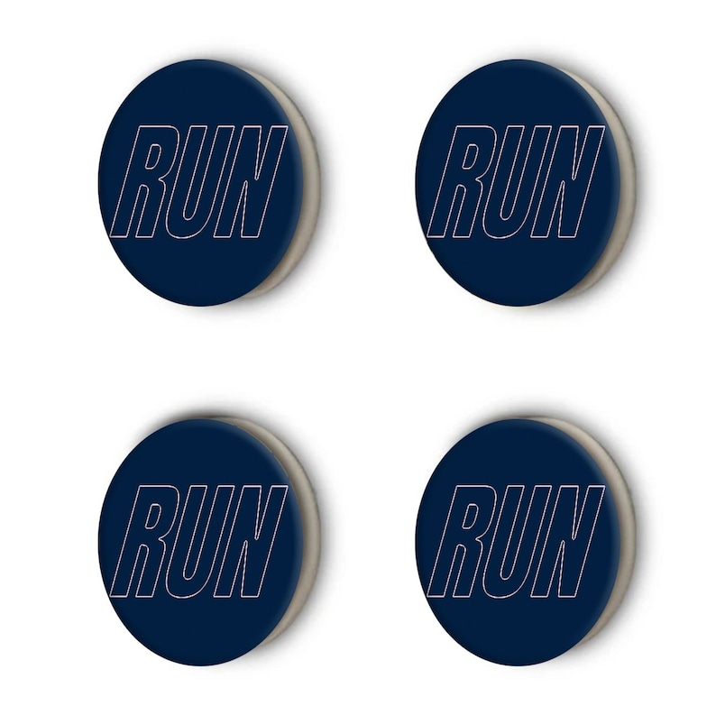 May include: Four round, dark blue buttons with a white outline of the word "RUN" on each.