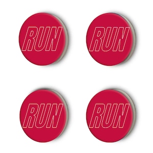 May include: Four red round buttons with white outline. Each button has the word "RUN" printed on it.