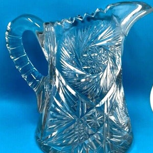 Clear Crystal star pitcher with bursting star on bottom