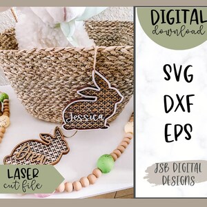May include: Two laser cut wooden bunny shapes with intricate designs. The bunnies are personalised with the names "Jessica" and "Dream". The image also includes a wicker basket, wooden beads, and the text "DIGITAL download SVG DXF EPS JSB DIGITAL DESIGNS LASER cut file".