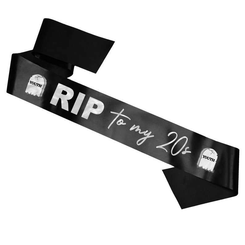 May include: Black satin sash with silver lettering that reads "RIP to my 20s". The sash has two small silver tombstone graphics with the word "Youth" on them.