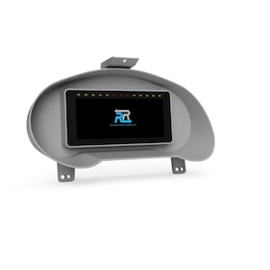 May include: A gray dashboard component with a rectangular black screen displaying a logo and text. The screen is surrounded by a gray bezel with mounting tabs. The top of the component has a small mounting bracket.