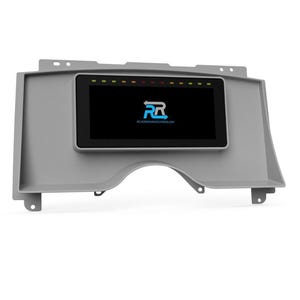 May include: A gray dashboard with a black screen displaying the logo "RR" for "Revolution Racing", with the text "revolutionracing.com" below the logo. The screen is surrounded by a gray bezel with a row of red, yellow, and green lights above the screen.