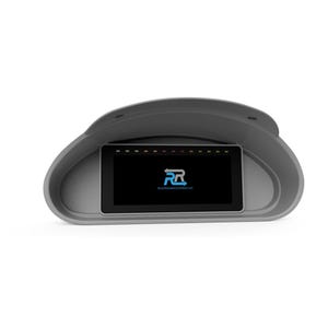 May include: A gray dashboard display with a black screen. The screen displays a logo and the website address REVERSIONRACEWORKS.COM. The display has a curved top and a rectangular screen. The display has a series of colored lights at the top.