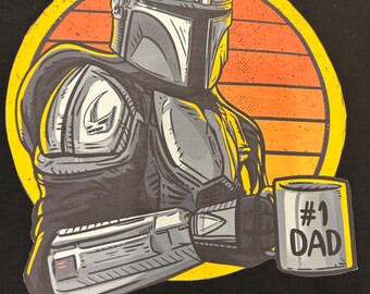 Mandalorian #1 Dad Premium T-Shirt in Mens sizes S-3XL in white or black! Printed on Kirkland brand T-Shirts! Image is 8 inch square